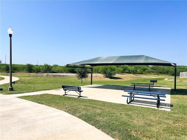 view of property's community featuring a gazebo and a lawn