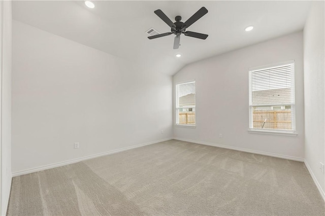 carpeted empty room featuring ceiling fan