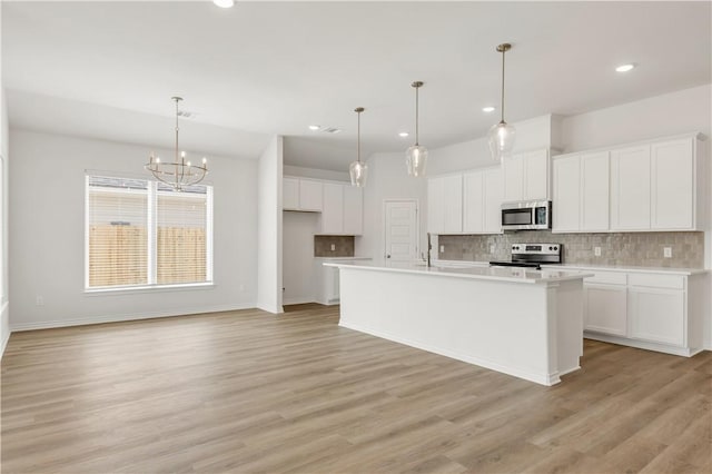 unfurnished room with vaulted ceiling and a healthy amount of sunlight