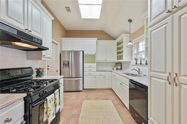 kitchen with sink, white cabinetry, hanging light fixtures, light stone countertops, and black appliances