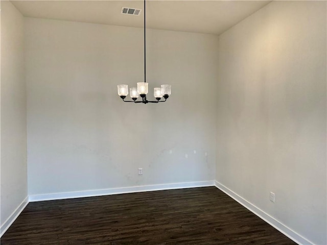 interior space with an inviting chandelier and dark wood-type flooring