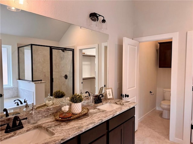 full bathroom featuring plus walk in shower, vanity, toilet, and vaulted ceiling