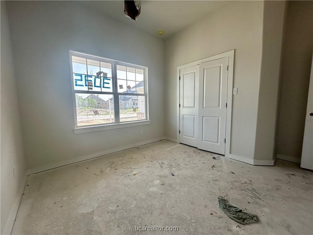 unfurnished bedroom featuring a closet