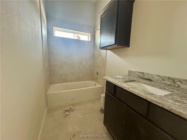 full bathroom with vanity, toilet, and tiled shower / bath