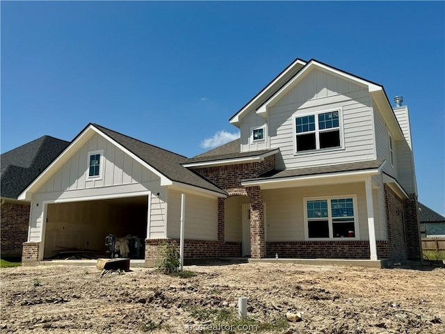 craftsman inspired home with a garage