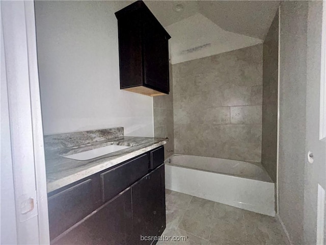 bathroom with vanity and tile patterned floors