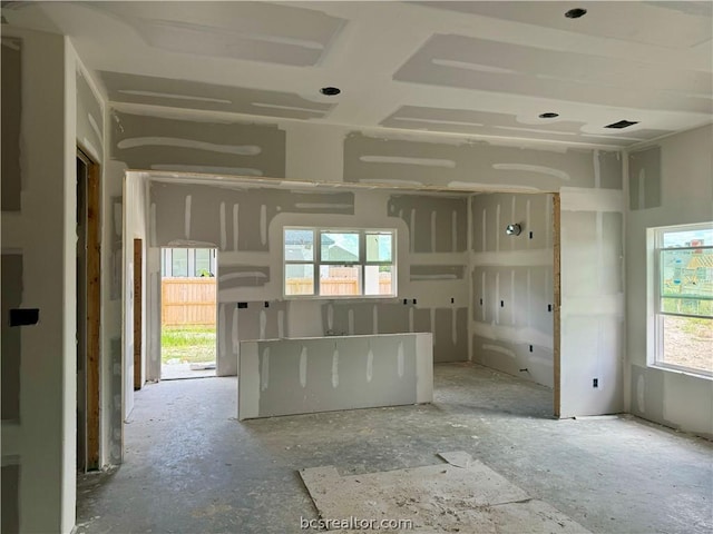 unfurnished living room with a wealth of natural light