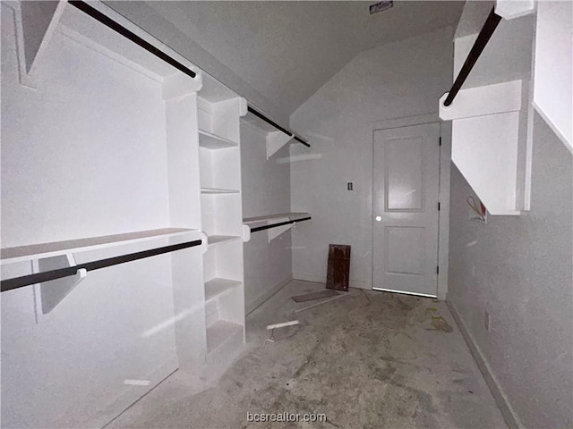 spacious closet with lofted ceiling