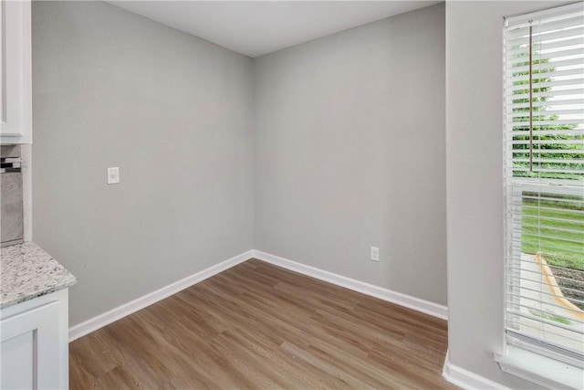 615 San Jacinto Ln, Bryan, TX 77803 - unfurnished dining area featuring light wood finished floors