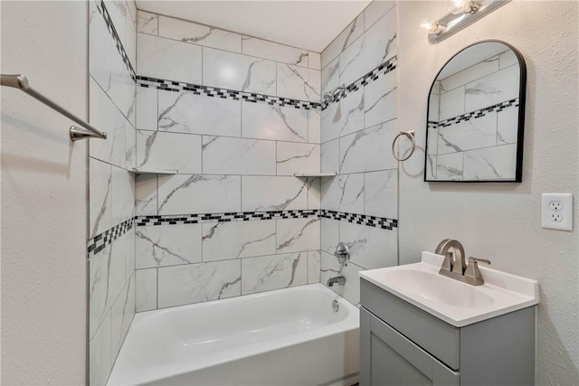 615 San Jacinto Ln, Bryan, TX 77803 - full bath featuring vanity, shower / bathtub combination, and a textured wall