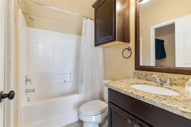 full bathroom with vanity, toilet, and shower / bath combo with shower curtain