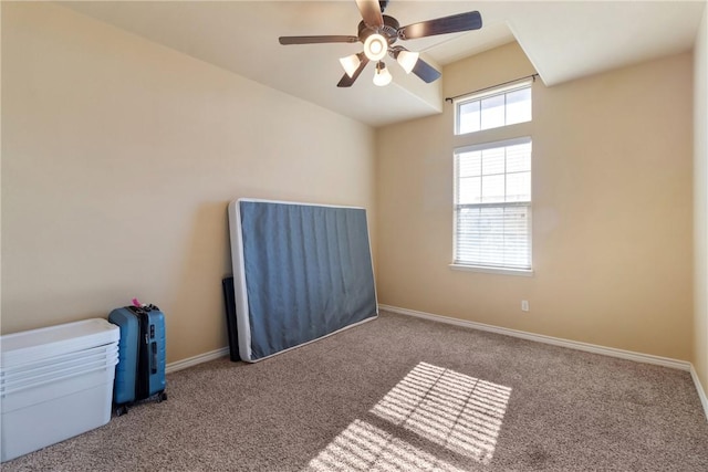 unfurnished bedroom with carpet flooring and ceiling fan