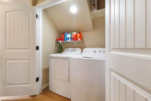 laundry room featuring washer and clothes dryer