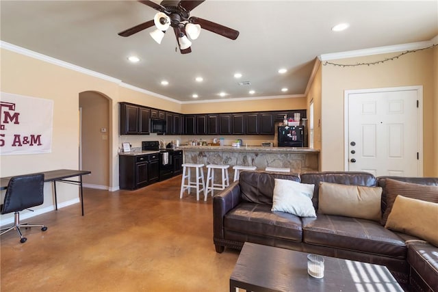 living room featuring crown molding, concrete flooring, and ceiling fan