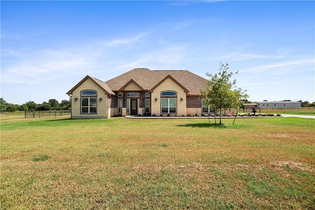 view of front of property with a front lawn