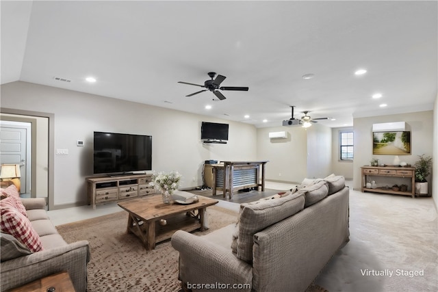 carpeted living room with a wall mounted AC, ceiling fan, and vaulted ceiling