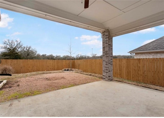 view of yard featuring a fenced backyard and a patio