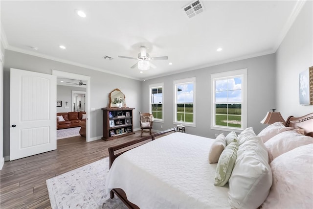 3785 County Road 405, Anderson, TX 77830 - bedroom featuring ornamental molding, wood finished floors, recessed lighting, and a ceiling fan