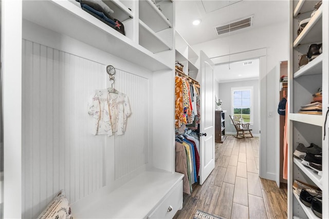 3785 County Road 405, Anderson, TX 77830 - mudroom featuring attic access and wood finished floors