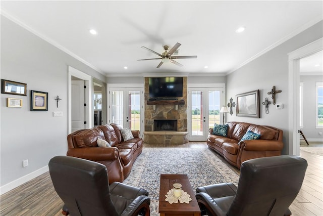 3785 County Road 405, Anderson, TX 77830 - living room with wood finished floors, french doors, recessed lighting, a stone fireplace, and ceiling fan