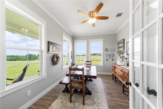 3785 County Road 405, Anderson, TX 77830 - dining area with ornamental molding, dark wood-style floors, and a ceiling fan