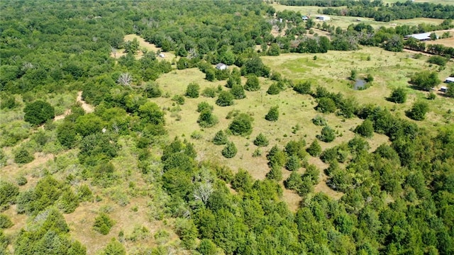 aerial view featuring a view of trees