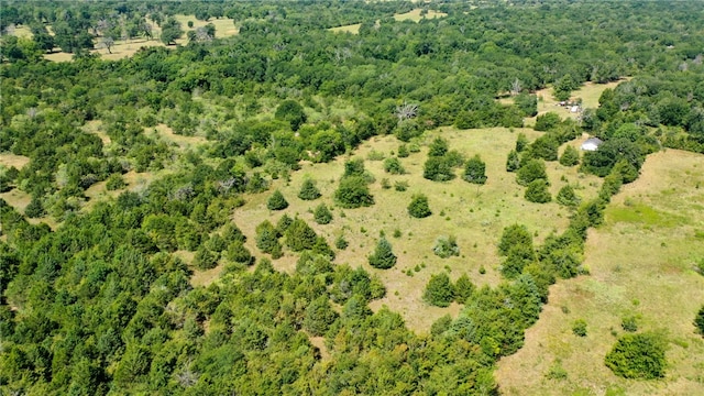 aerial view featuring a view of trees