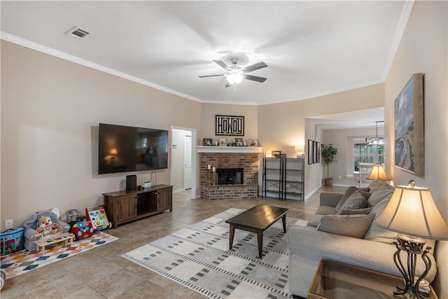 tiled living room with crown molding, visible vents, ceiling fan, and a fireplace