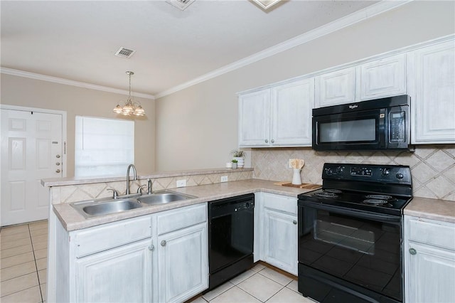 kitchen featuring a peninsula, a sink, light tile patterned flooring, visible vents, and black appliances