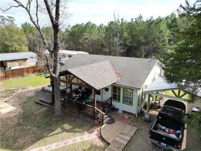 view of front of property with a carport