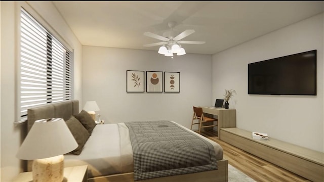 bedroom with wood finished floors and a ceiling fan