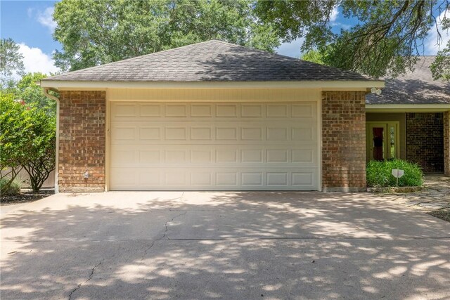 2629 Benton Dr, Brenham, TX 77833 - garage featuring driveway