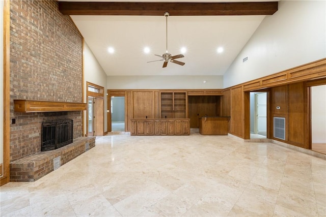 2629 Benton Dr, Brenham, TX 77833 - unfurnished living room featuring high vaulted ceiling, ceiling fan, a fireplace, beamed ceiling, and recessed lighting