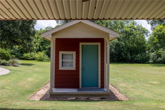 2629 Benton Dr, Brenham, TX 77833 - view of shed featuring view of wooded area