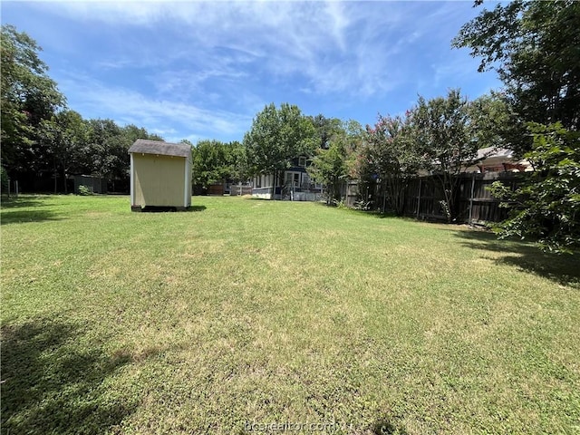 708 E 27th St E, Bryan, TX 77803 - view of yard featuring a shed