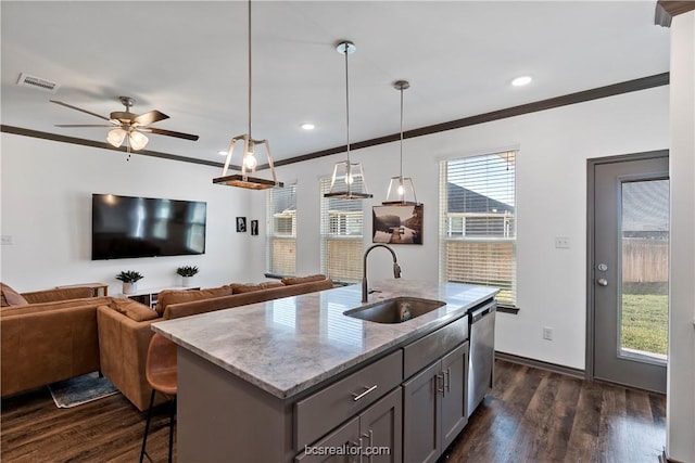1000 Granite Ct, Bryan, TX 77803 - kitchen featuring a sink, ornamental molding, dishwasher, dark wood-type flooring, and open floor plan