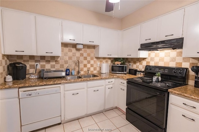 kitchen with tasteful backsplash, white dishwasher, sink, black electric range, and white cabinetry