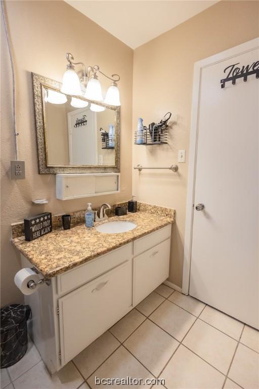 bathroom featuring vanity and tile patterned floors