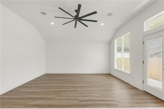 additional living space with lofted ceiling, ceiling fan, and light hardwood / wood-style flooring