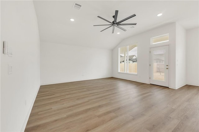 bonus room with vaulted ceiling, ceiling fan, and light wood-type flooring