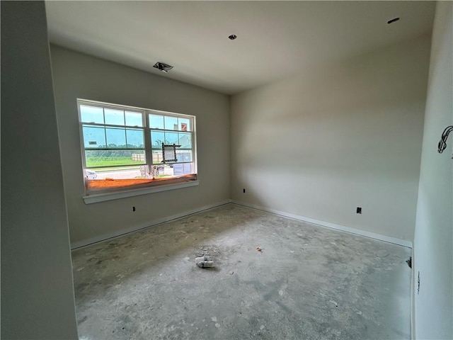 1937 Pinemont View Dr, Bryan, TX 77807 - spare room with concrete floors and baseboards