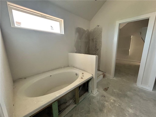 1937 Pinemont View Dr, Bryan, TX 77807 - bathroom featuring a stall shower, a garden tub, and vaulted ceiling