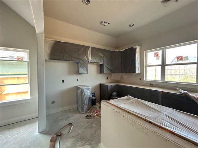 1937 Pinemont View Dr, Bryan, TX 77807 - kitchen with concrete flooring and baseboards