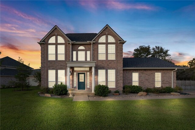 5115 Bellerive Bend Dr, College Station, TX 77845 - view of front of house featuring brick siding and roof with shingles
