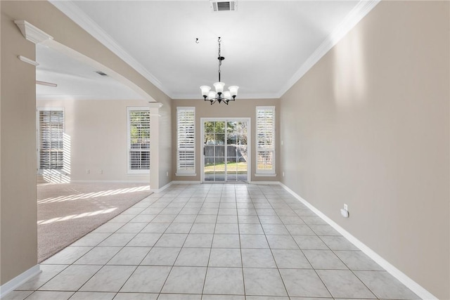 interior space with crown molding, light tile patterned floors, and a notable chandelier