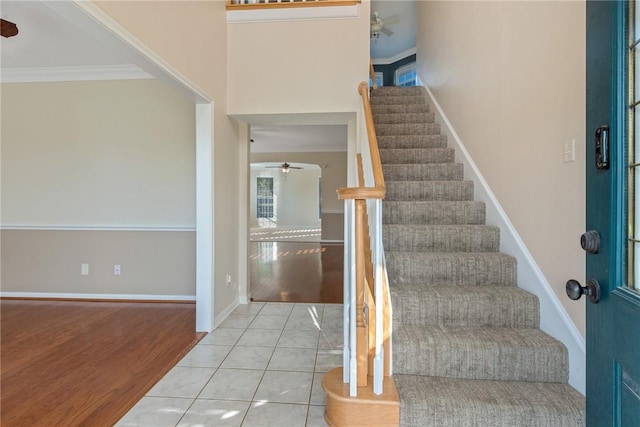 5115 Bellerive Bend Dr, College Station, TX 77845 - stairway featuring ceiling fan, crown molding, tile patterned flooring, and baseboards