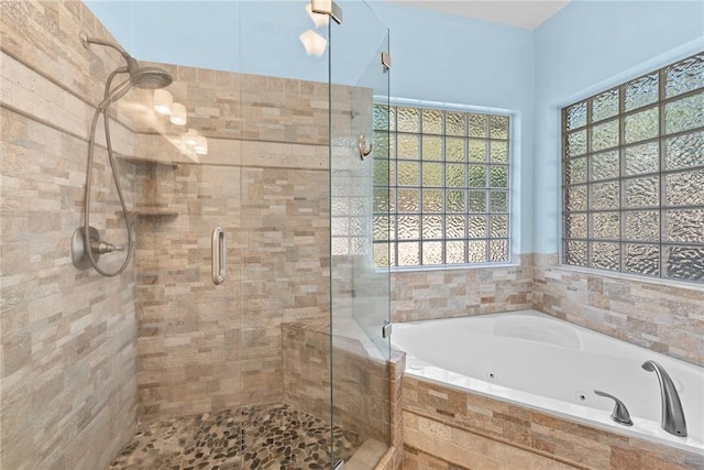 5115 Bellerive Bend Dr, College Station, TX 77845 - bathroom featuring a shower stall, plenty of natural light, and a jetted tub