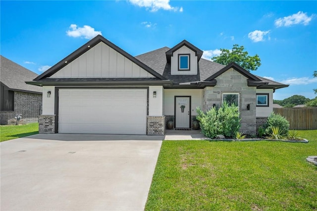 2987 Archer Dr, Bryan, TX 77808 - view of front of property featuring brick siding, a garage, roof with shingles, and driveway