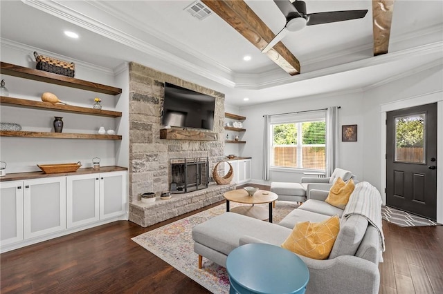 2987 Archer Dr, Bryan, TX 77808 - living room featuring crown molding, dark wood-type flooring, recessed lighting, a stone fireplace, and ceiling fan