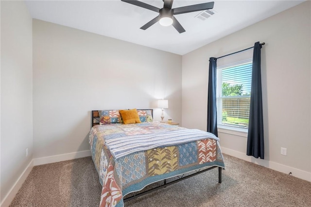 2987 Archer Dr, Bryan, TX 77808 - bedroom with carpet flooring, baseboards, and ceiling fan